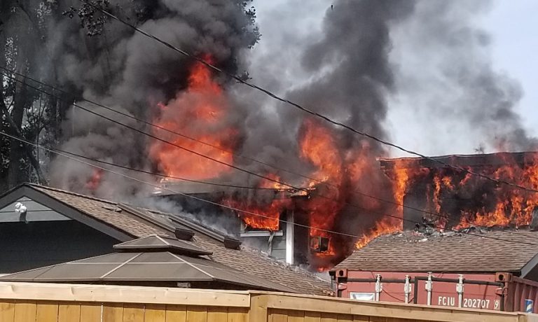 One person sent to hospital following afternoon house fire