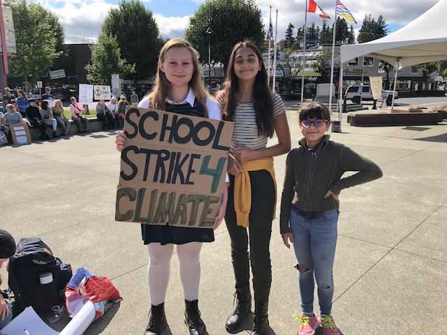 Climate rally brings students and adults to Spirit Square