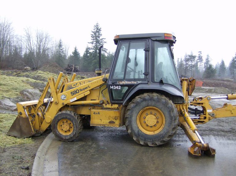 Backhoe missing from Jubilee Parkway, Willow Creek site