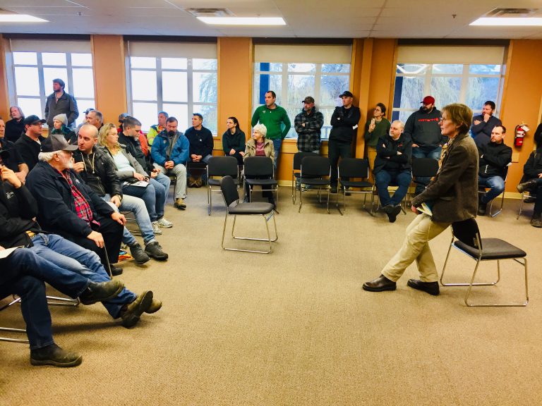 Contractors, workers pack room to talk to MLA about forest workers strike